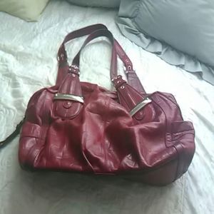 B. MAKOWSKY red leather bag